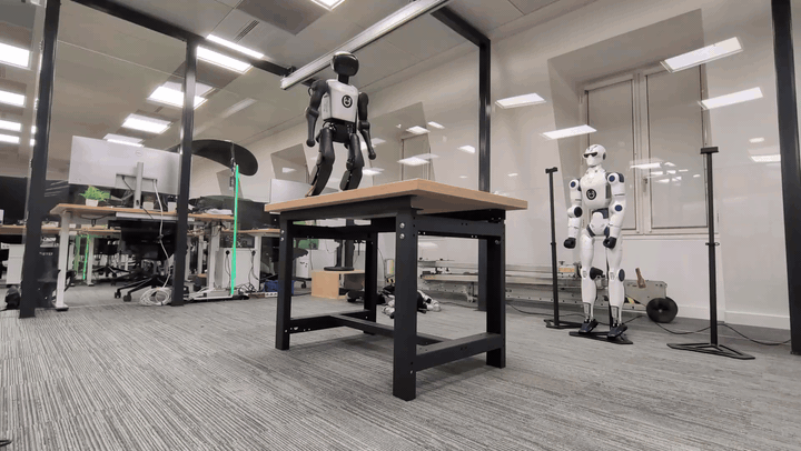 Booster K1 humanoid performing a frontflip off a table and landing on its feet